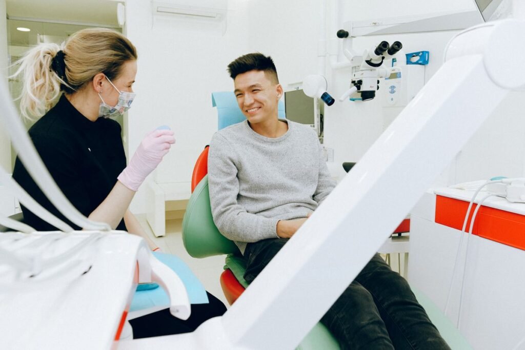 Patient smiling after cosmetic dental treatment