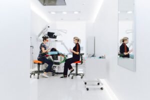 Dental implant consultation with a model