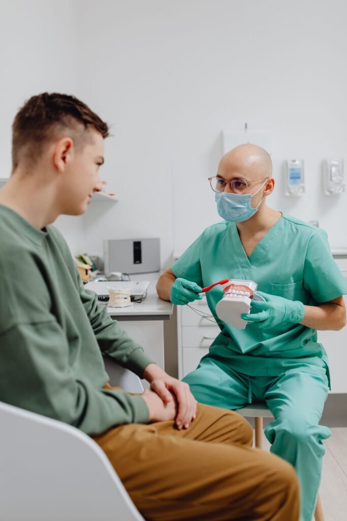 Dentist providing urgent dental care to a patient